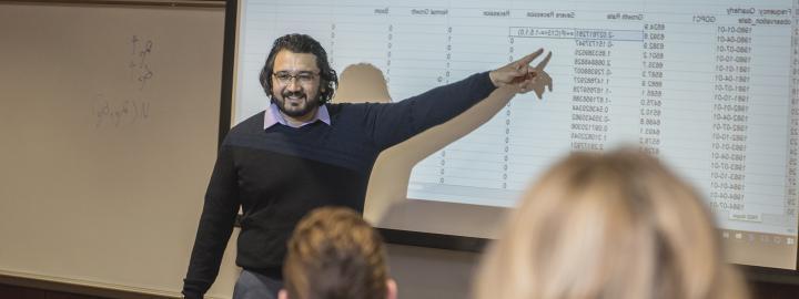 Dr. Nazarov teaching students in classroom